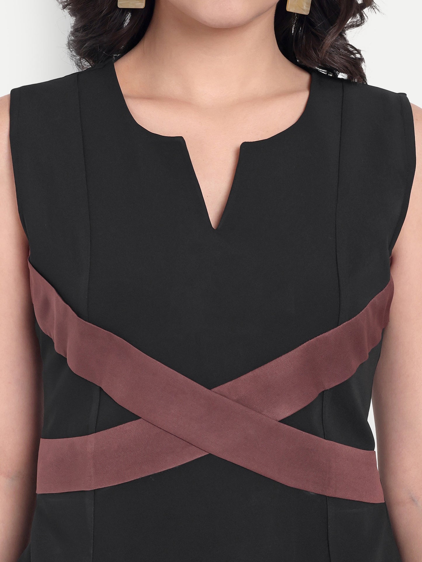 Black top with brown cross bow pattern - esseneur. 